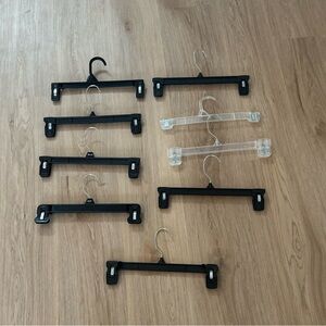 Lot of 9 plastic pants clip hangers